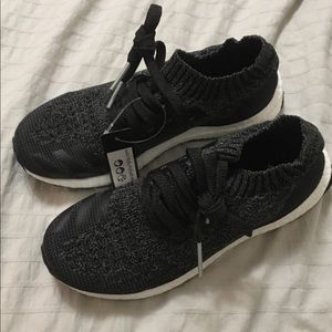 Brand new size 7 WMN / 5  Ultraboost uncaged.